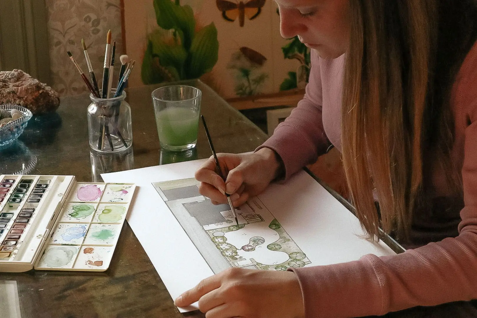 Malou designar en trädgård